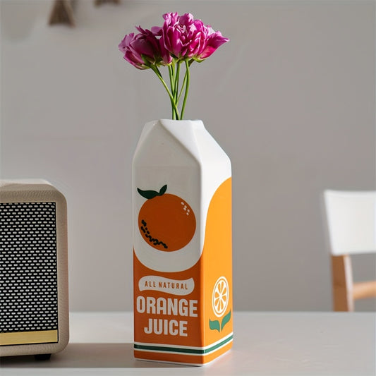 Vase Orange Juice : un vase déco vintage en céramique, parfait pour des fleurs éclatantes.