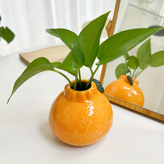 Vase Orange en céramique, parfait pour une décoration vintage et chaleureuse avec des fleurs.